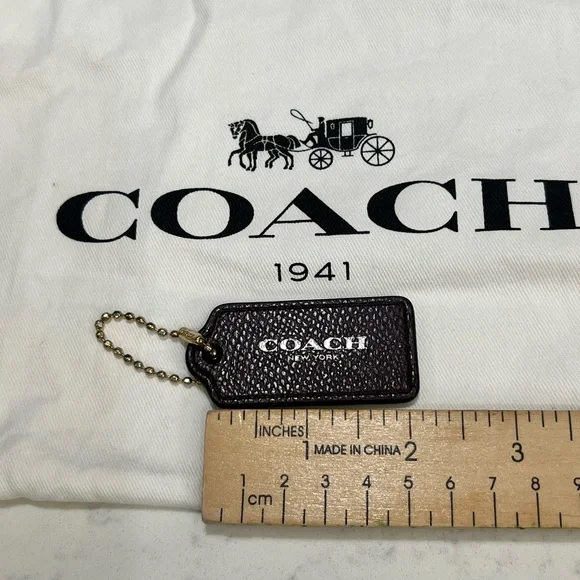 Coach New York Pebbled Leather Bag Tag in mapla with Gold Chain - Picture 9 of 9